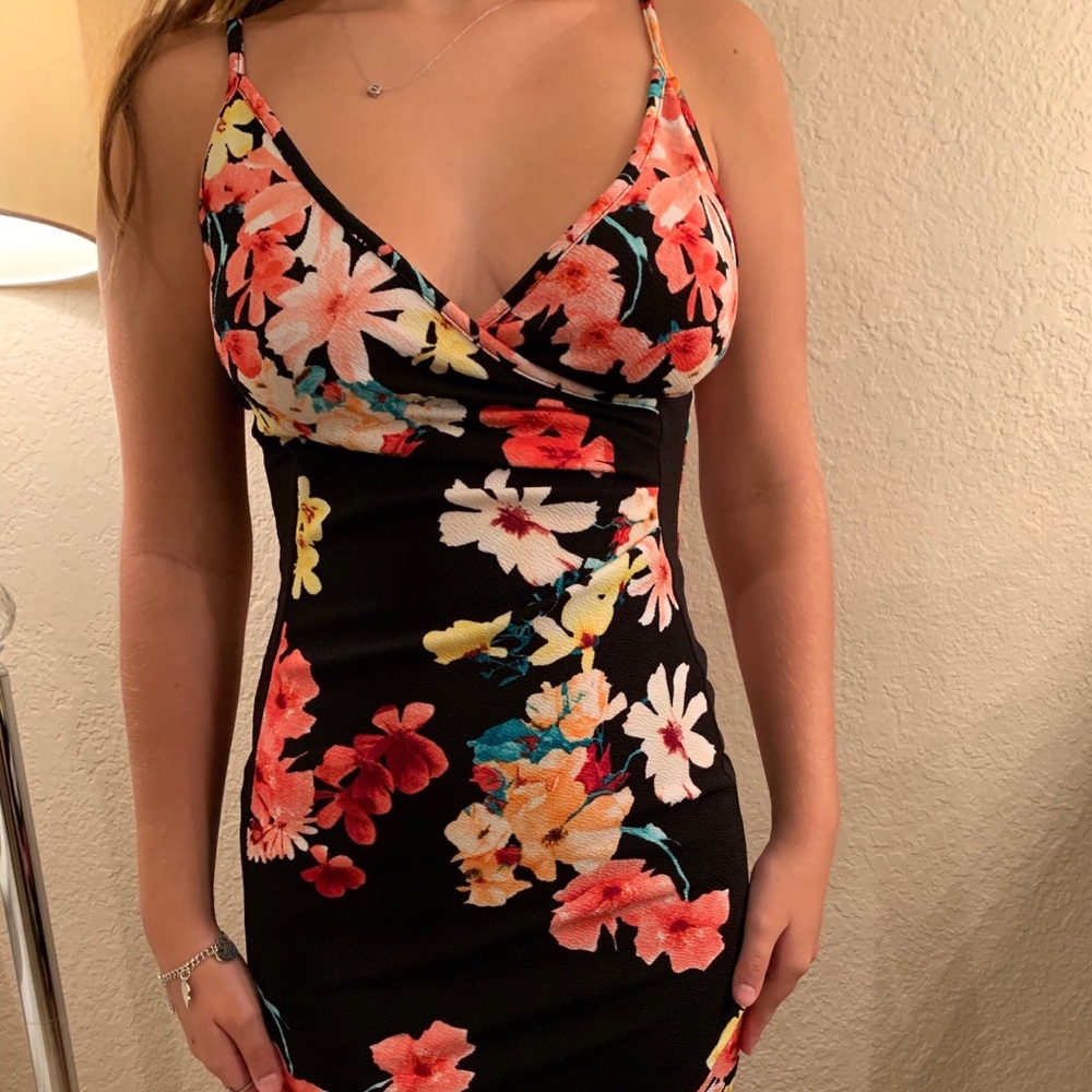 black dress with floral design